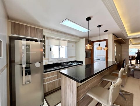 Apartamento com 108m², 3 dormitórios, 1 suíte, 3 vagas, Edifício Rio Jordão em Capão da Canoa