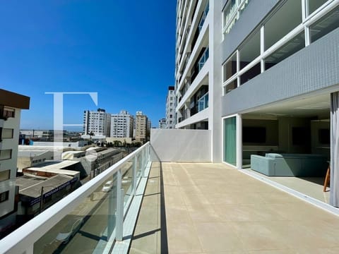 Apartamento com 128m², 3 dormitórios, 1 suíte, 2 vagas, Edifício Premium em Capão da Canoa