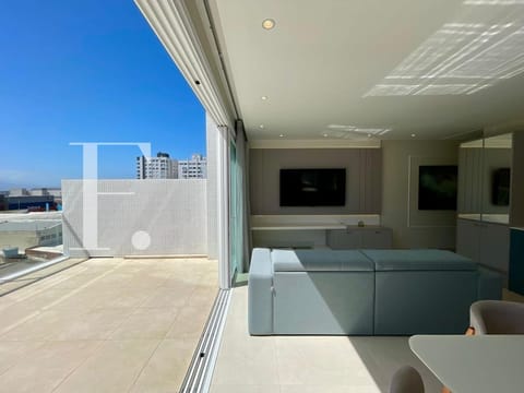 Apartamento com 128m², 3 dormitórios, 1 suíte, 2 vagas, Edifício Premium em Capão da Canoa
