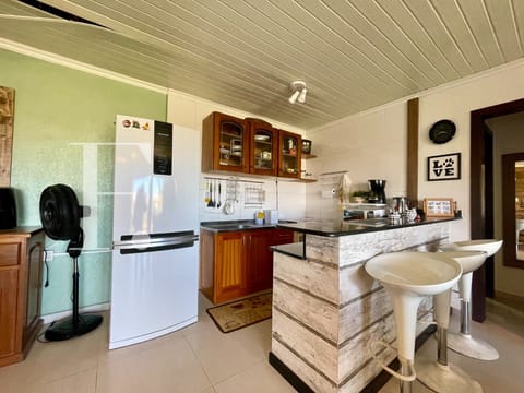 Casa com 140m², 3 dormitórios, 1 suíte, 2 vagas, no bairro Arpoador em Xangri-Lá