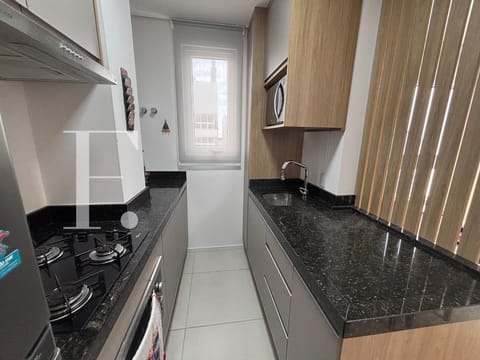 Apartamento com 77m², 2 dormitórios, 1 suíte, 1 vaga, Edifício Verano em Capão da Canoa