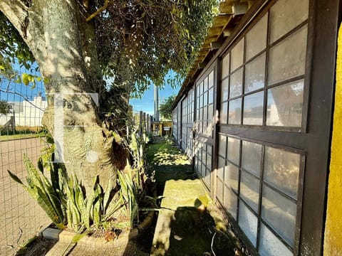 Casa com 110m², 4 dormitórios, 2 suítes, 2 vagas, no bairro Rainha do Mar em Xangri-Lá