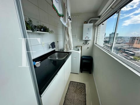 Apartamento com 65m², 2 dormitórios, 1 suíte, 1 vaga, Edifício Portofino em Capão da Canoa