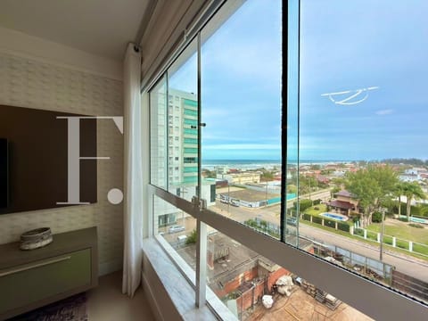 Apartamento com 64m², 2 dormitórios, 1 suíte, 1 vaga, Edifício Wave em Capão da Canoa