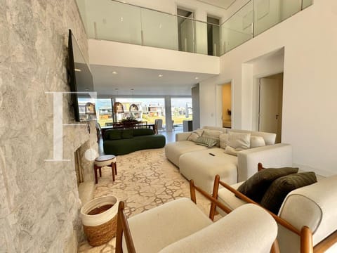 Sobrado com 280m², 4 dormitórios, 4 suítes, 2 vagas, Sunset em Xangri-Lá