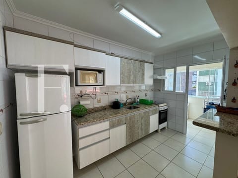 Apartamento com 90m², 2 dormitórios, 1 suíte, 1 vaga, Edifício Munique em Capão da Canoa
