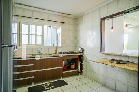 Casa com 128m², 3 dormitórios, 1 suíte, 2 vagas, no bairro Remanso em Xangri-Lá