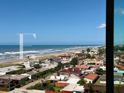 Apartamento com 109m², 3 dormitórios, 1 suíte, 2 vagas, Bella Vision em Capão da Canoa