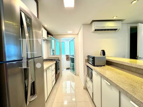 Apartamento com 79m², 2 dormitórios, 1 suíte, 2 vagas, Edifício Deauville em Capão da Canoa