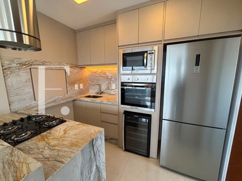 Apartamento com 97m², 3 dormitórios, 1 suíte, 2 vagas, Edifício Premium em Capão da Canoa
