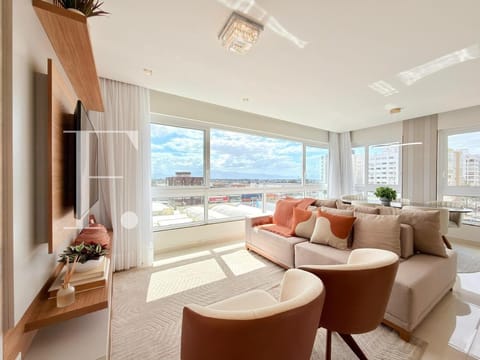 Apartamento com 143m², 3 dormitórios, 1 suíte, 2 vagas, Edifício Premium em Capão da Canoa