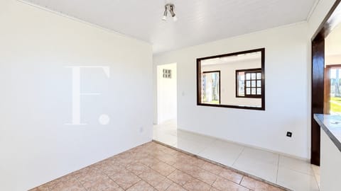 Casa com 122m², 2 dormitórios, 2 vagas, no bairro Rainha do Mar em Xangri-Lá
