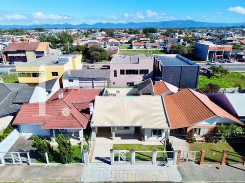 Casa com 124m², 3 dormitórios, 1 suíte, 2 vagas, no bairro Noiva do Mar em Xangri-Lá
