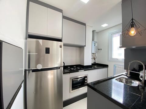 Apartamento com 77m², 2 dormitórios, 1 suíte, 1 vaga, Edifício Verano em Capão da Canoa