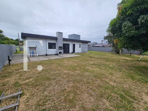 Casa com 77m², 2 dormitórios, no bairro Atlântida em Xangri-Lá