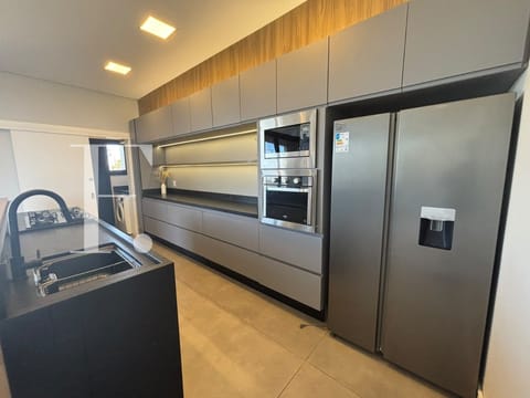 Sobrado com 200m², 4 dormitórios, 1 suíte, Santorini em Xangri-Lá