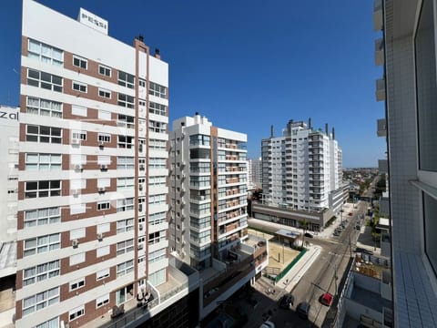 Apartamento com 75m², 2 dormitórios, 1 suíte, 1 vaga, Sunset Residence em Capão da Canoa