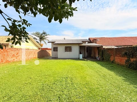 Casa com 60m², 2 dormitórios, 1 vaga, no bairro Arpoador em Xangri-Lá