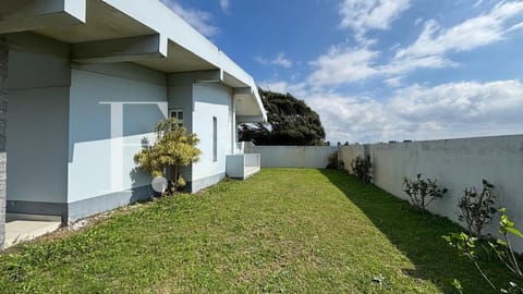 Casa com 180m², 3 dormitórios, 1 suíte, 2 vagas, no bairro Remanso em Xangri-Lá