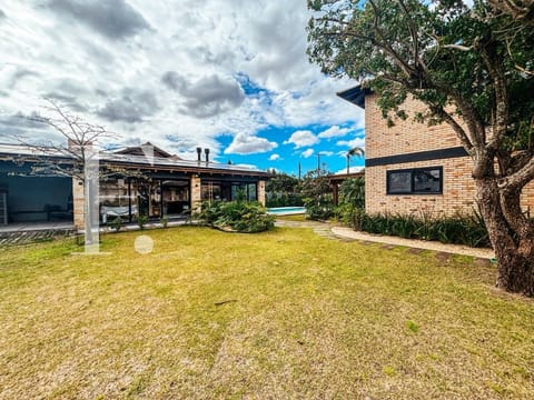 Casa com 206m², 4 dormitórios, 1 suíte, 2 vagas, no bairro Remanso em Xangri-Lá