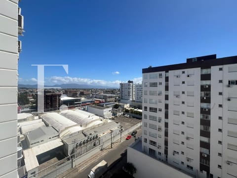 Apartamento com 66m², 2 dormitórios, 1 suíte, 1 vaga, Edifício Premium em Capão da Canoa