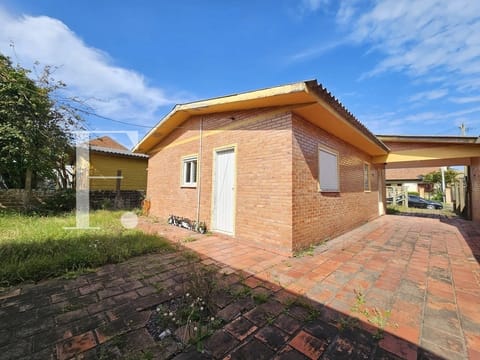 Casa com 106m², 3 dormitórios, 2 vagas, no bairro Rainha do Mar em Xangri-Lá