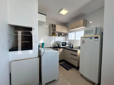 Apartamento com 52m², 2 dormitórios, 1 suíte, 1 vaga, Residencial Laodiceia em Capão da Canoa