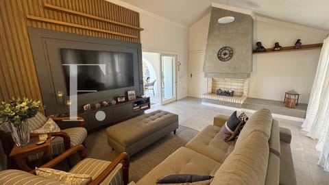 Casa com 220m², 4 dormitórios, 1 suíte, no bairro Atlântida em Xangri-Lá