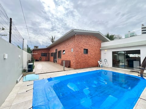 Casa com 209m², 4 dormitórios, 2 suítes, no bairro Atlântida em Xangri-Lá